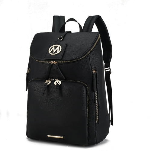 A black vegan leather backpack with multiple zippers and a large front pocket. The Angela Large Backpack Vegan Leather by Pink Orpheus features a prominent gold "M" emblem and two small heart-shaped zipper pulls. It has padded shoulder straps, making it an ideal travel backpack.