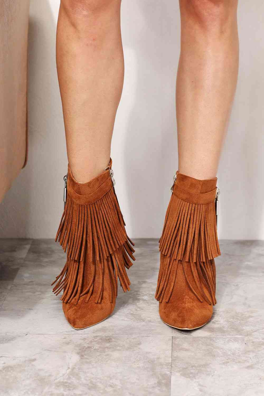 Legend Women's Tassel Wedge Heel Ankle Booties" in vegan suede with an open shank design by Trendsi.