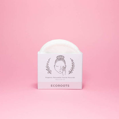 Efficient White Smokey Organic Makeup Remover wipes on a pink background.