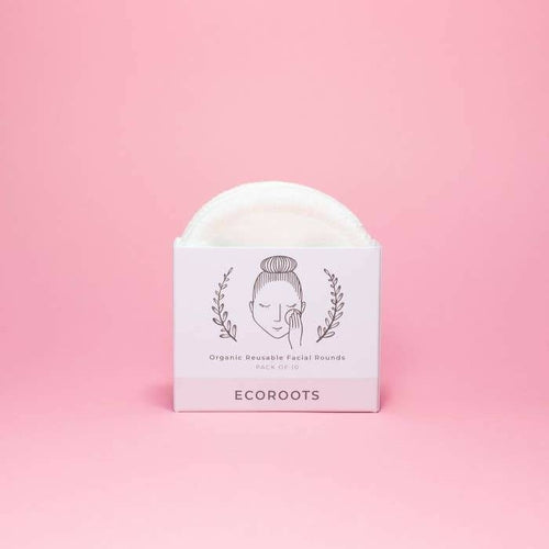 Efficient non-toxic White Smokey makeup remover wipes on a pink background.