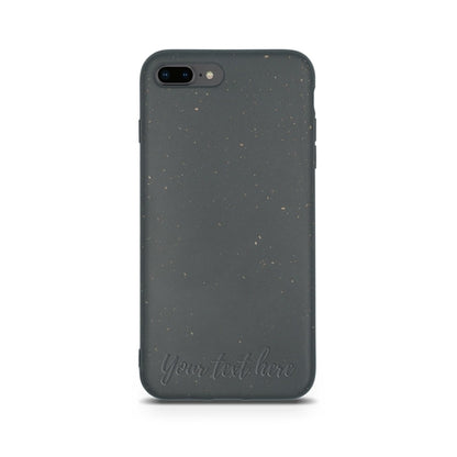 A dark gray speckled Tan Lily Biodegradable Personalized iPhone Case with customizable text area reading "Your text here" on a white background.