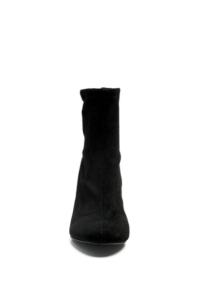 Black vegan micro suede ankle boot with a side zipper, isolated on a white background, by Ruby Smudge.