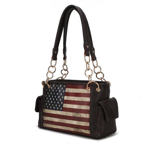 The Pink Orpheus Alaina Vegan Leather Women's Flag Shoulder Bag combines style and functionality with its eye-catching American flag design. Made from vegan leather, this handbag is not only fashionable but also cruelty-free.