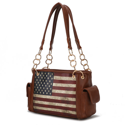The Pink Orpheus Alaina Vegan Leather Women's Flag Shoulder Bag combines style and functionality, featuring an American flag design on vegan leather.