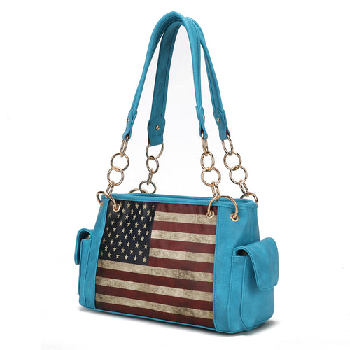 The Pink Orpheus Alaina Vegan Leather Women's Flag Shoulder Bag combines style and functionality with its blue design and iconic American flag emblem.