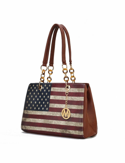 A Nevaeh Vegan Leather patriotic pattern Women Shoulder Bag with a Pink Orpheus logo charm.