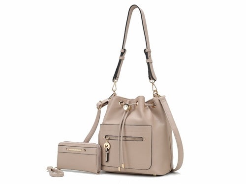 A Larissa Vegan Leather Women's Bucket Bag with Wallet set made from Pink Orpheus vegan leather with adjustable straps.