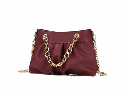 A fashion-forward Marvila Minimalist Vegan Leather Chain Ruched Shoulder Bag made with vegan leather and accentuated by a gold chain, branded by Pink Orpheus.