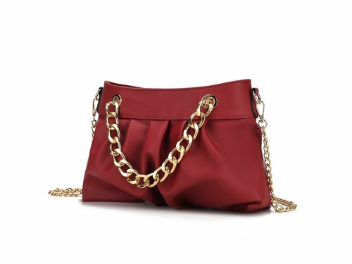 A fashion-forward Marvila Minimalist Vegan Leather Chain Ruched Shoulder Bag made by Pink Orpheus with a gold chain.