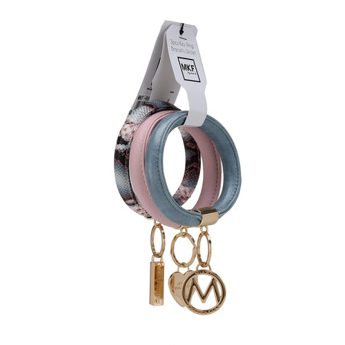 Pink Orpheus Jasmine Vegan Leather Women Bangle Wristlet Keychain set with a metal charm and tag against a white background.