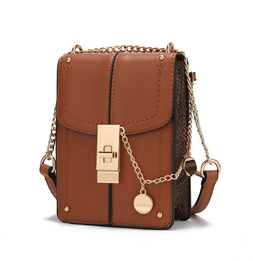An Iona Crossbody Handbag Vegan Leather Women by Pink Orpheus with a gold chain.