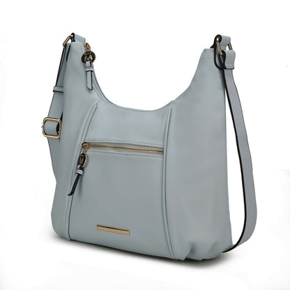 A Lavinia Vegan Leather Women's Shoulder Bag by Pink Orpheus, a light blue hobo bag with a zipper, perfect for the fashion-forward woman.