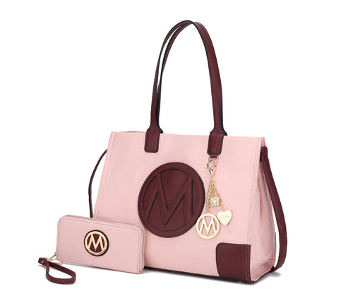 A Louise Tote Handbag and Wallet Set Vegan Leather by Pink Orpheus with the letter m on it.