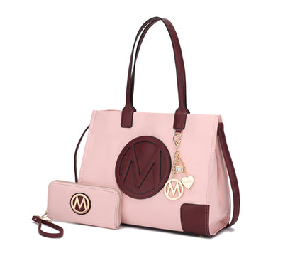 A Louise Tote Handbag and Wallet Set Vegan Leather by Pink Orpheus with the letter m on it.