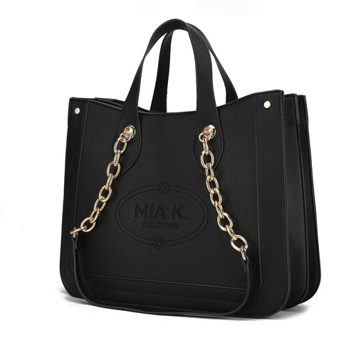A Stella Vegan Leather Women Tote Bag by Pink Orpheus with a chain handle and accessories.