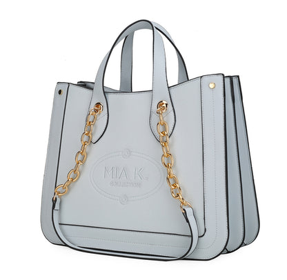 A light blue Stella Vegan Leather Women Tote Bag with gold chain handles, perfect for carrying your daily essentials.