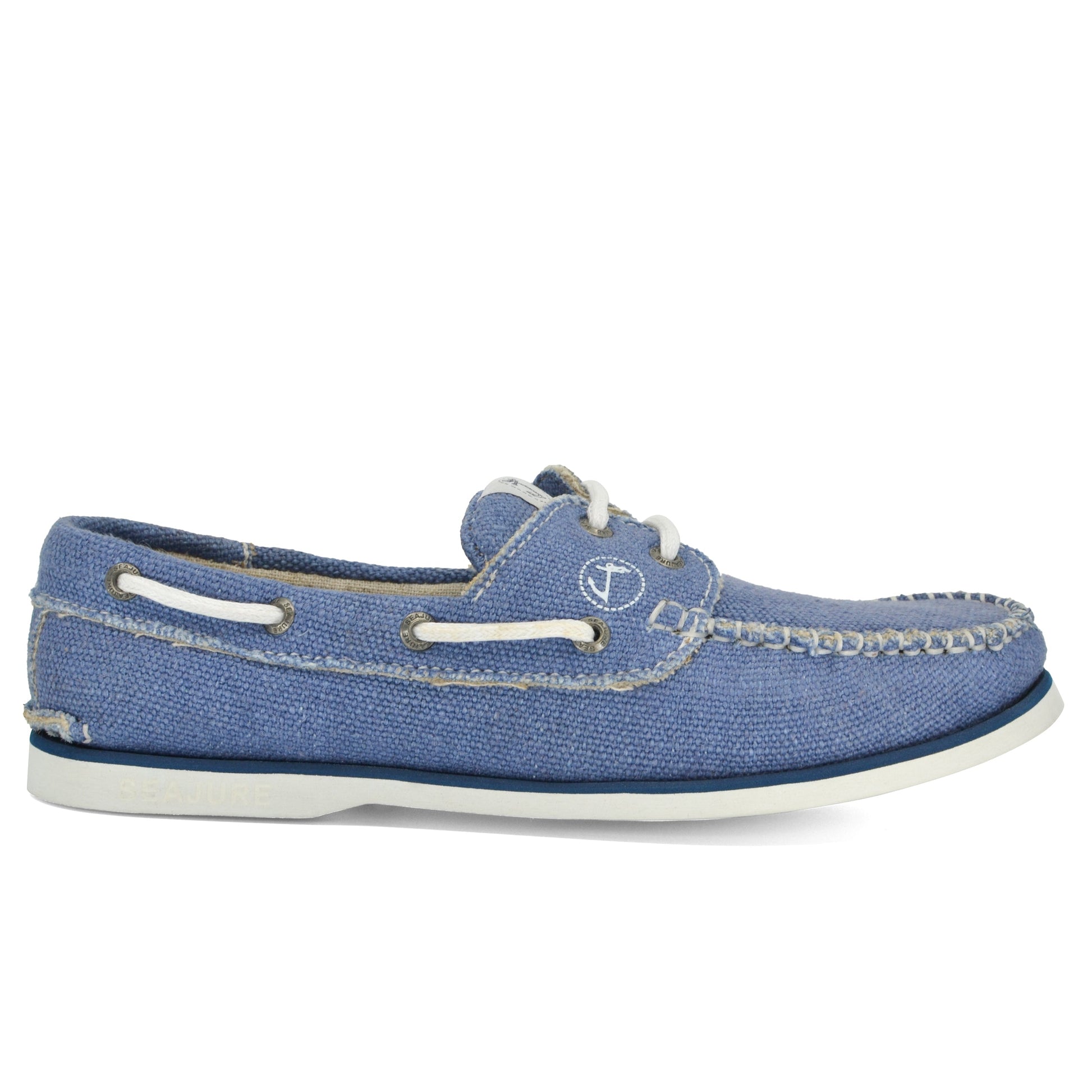 Blue denim Men Hemp & Vegan boat shoe Fidden with white stitching and laces, featuring a natural rubber sole and metal eyelets on a plain background by Amethyst Hestia.