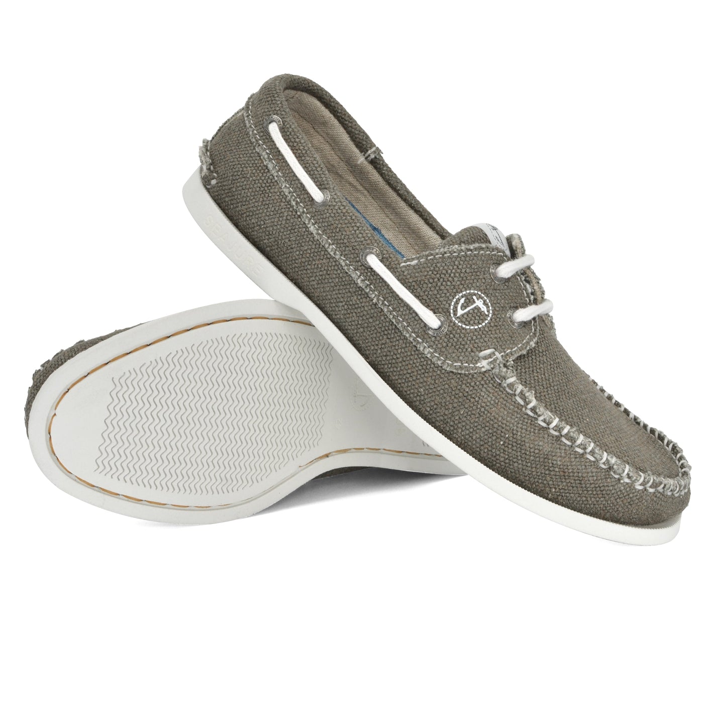 A pair of gray Amethyst Hestia Men Hemp & Vegan Boat Shoe Scopello crafted with premium hemp and featuring white natural rubber soles, white laces, and visible stitching is shown, one shoe resting on top of the other.