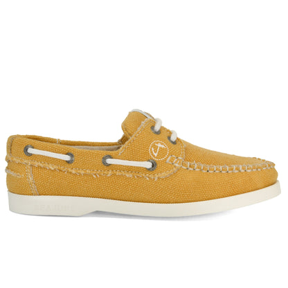 Discover the Amethyst Hestia Women Hemp & Vegan Boat Shoe Saharun: a single yellow shoe with white stitching and laces, featuring a white rubber sole and a small logo embroidered on the side. Crafted with premium hemp for ultimate sustainability, it embodies eco-friendly fashion without compromising on style.