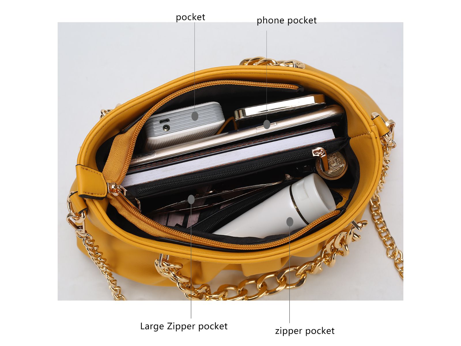 A fashion-forward Marvila Minimalist Vegan Leather Chain Ruched Shoulder Bag made by Pink Orpheus, containing a cell phone and other items inside.