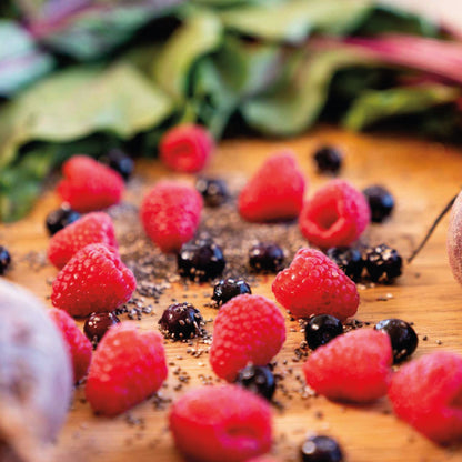 Ultra-Nourishing Exfoliating Mask by Cyan Ares on a cutting board.