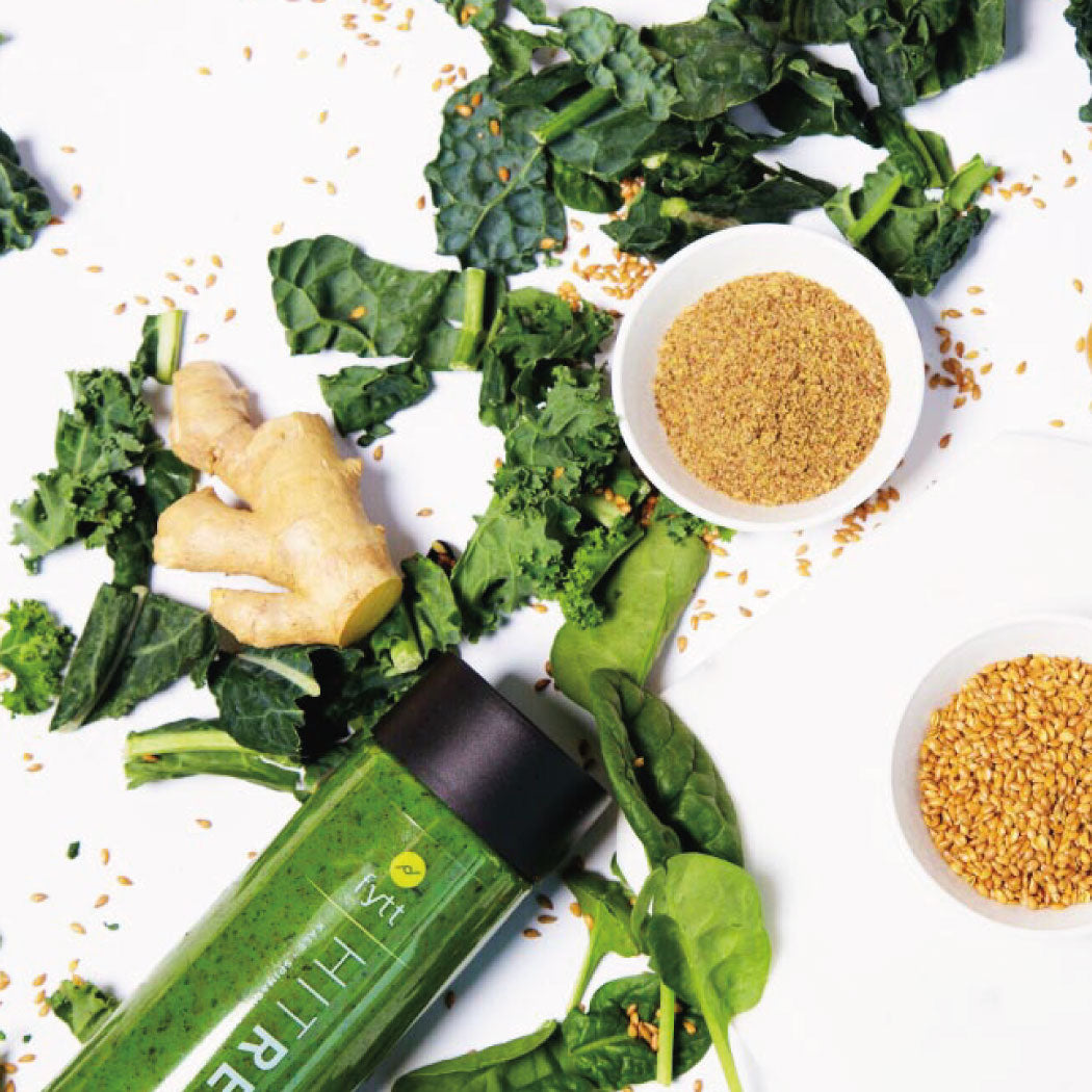 Detoxifying Exfoliating Mask for skin health surrounded by ingredients like kale, ginger, and seeds by Cyan Ares.