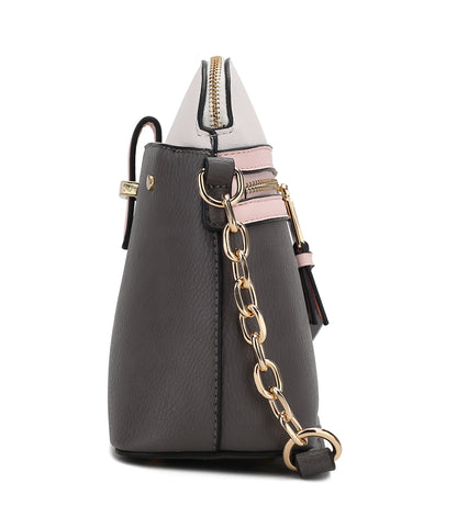 The Karelyn Crossbody Handbag Vegan Leather Women by Pink Orpheus is a sustainable and vegan leather accessory featuring a grey and pink design with a stylish chain handle.