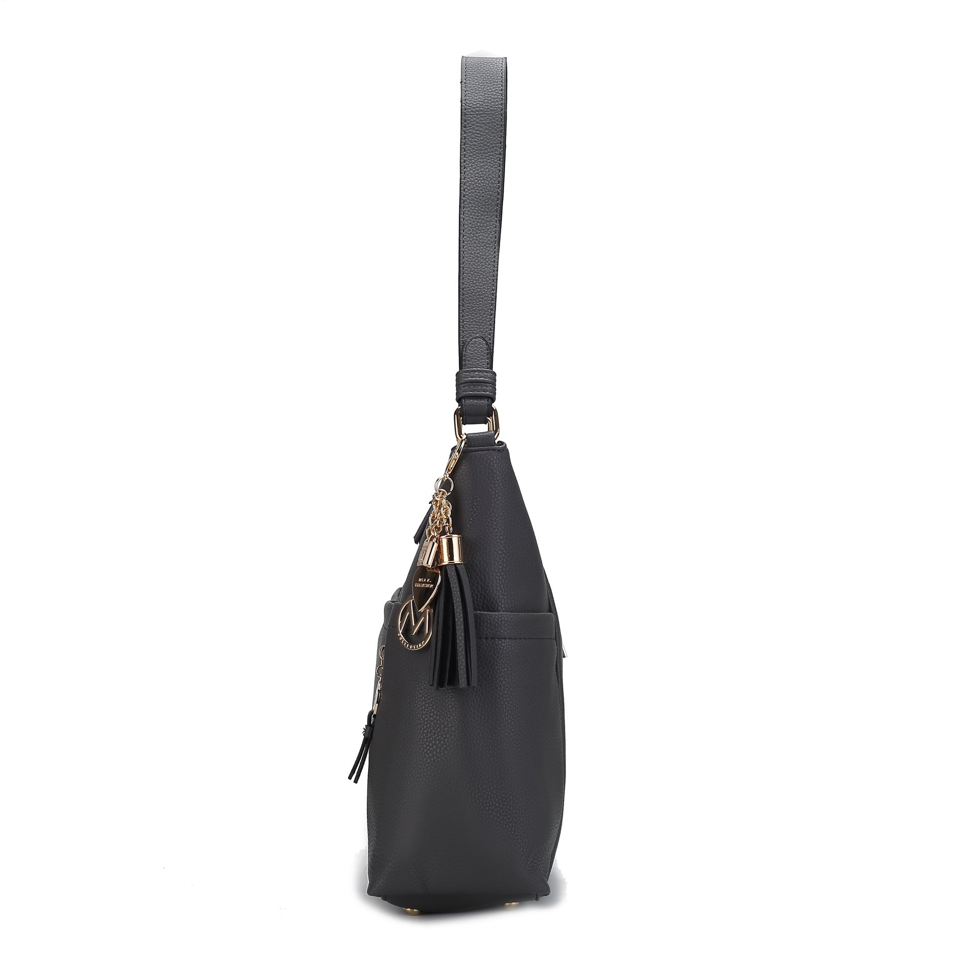 Pink Orpheus' Ruby Vegan Leather Women Shoulder Bag with tassel detail on a white background.