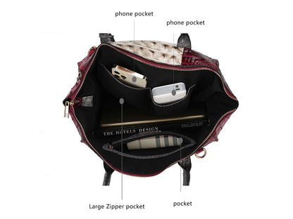 The contents of a Pink Orpheus Ember Faux Crocodile-Embossed Vegan Leather Women’s Satchel bag with an adjustable strap, including a cell phone inside.