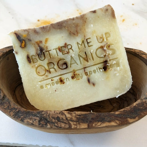 White Smokey Balthazar All Over Bar / Organic Soap Vegan in a wooden bowl.