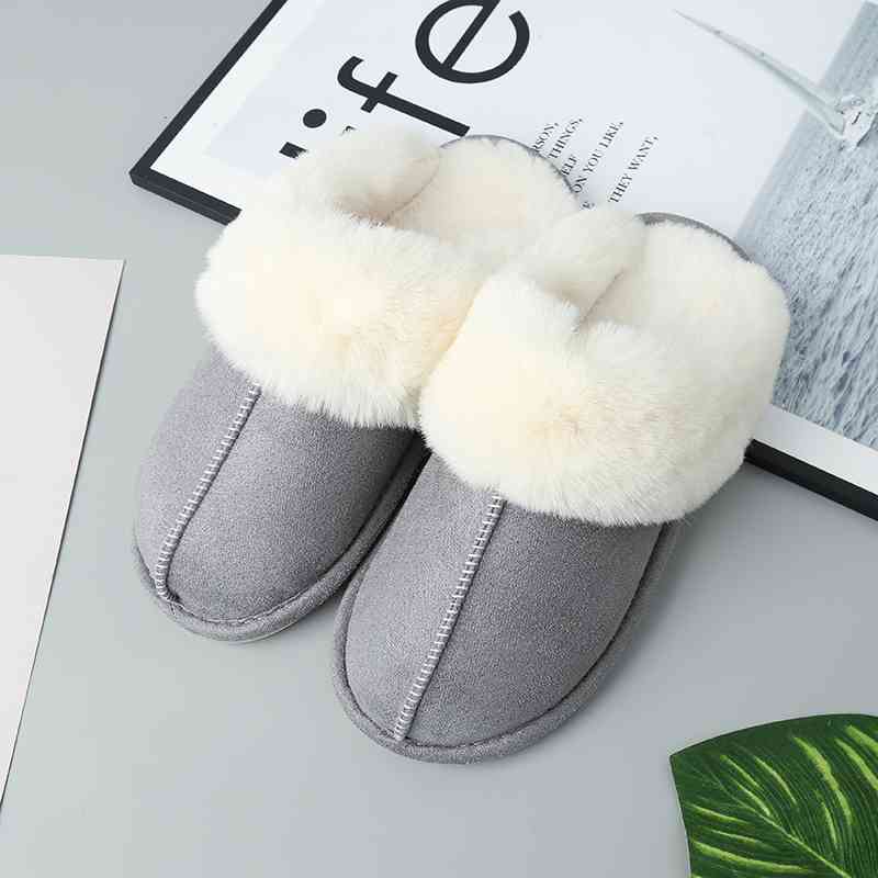 These Trendsi vegan suede center seam slippers are both comfortable and stylish, featuring a luxurious fur lining for added warmth.