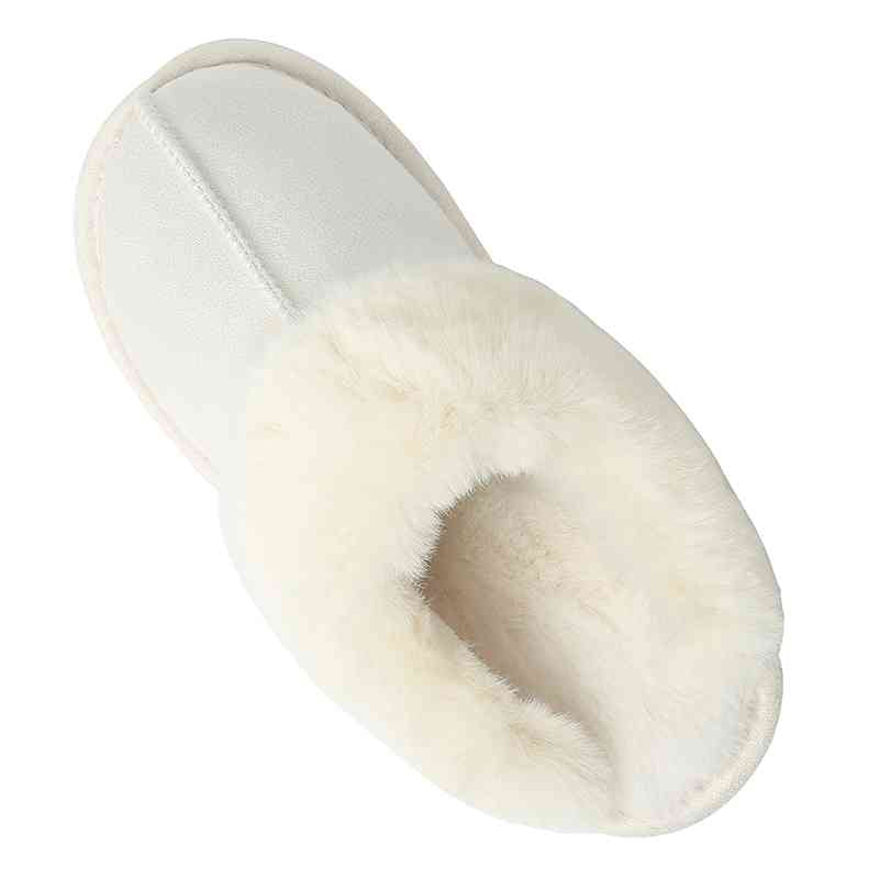 Comfortable Trendsi vegan suede center seam slippers on a white background.