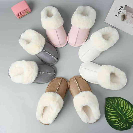 A collection of comfortable Trendsi Vegan Suede Center Seam Slippers made from vegan suede in various colors.