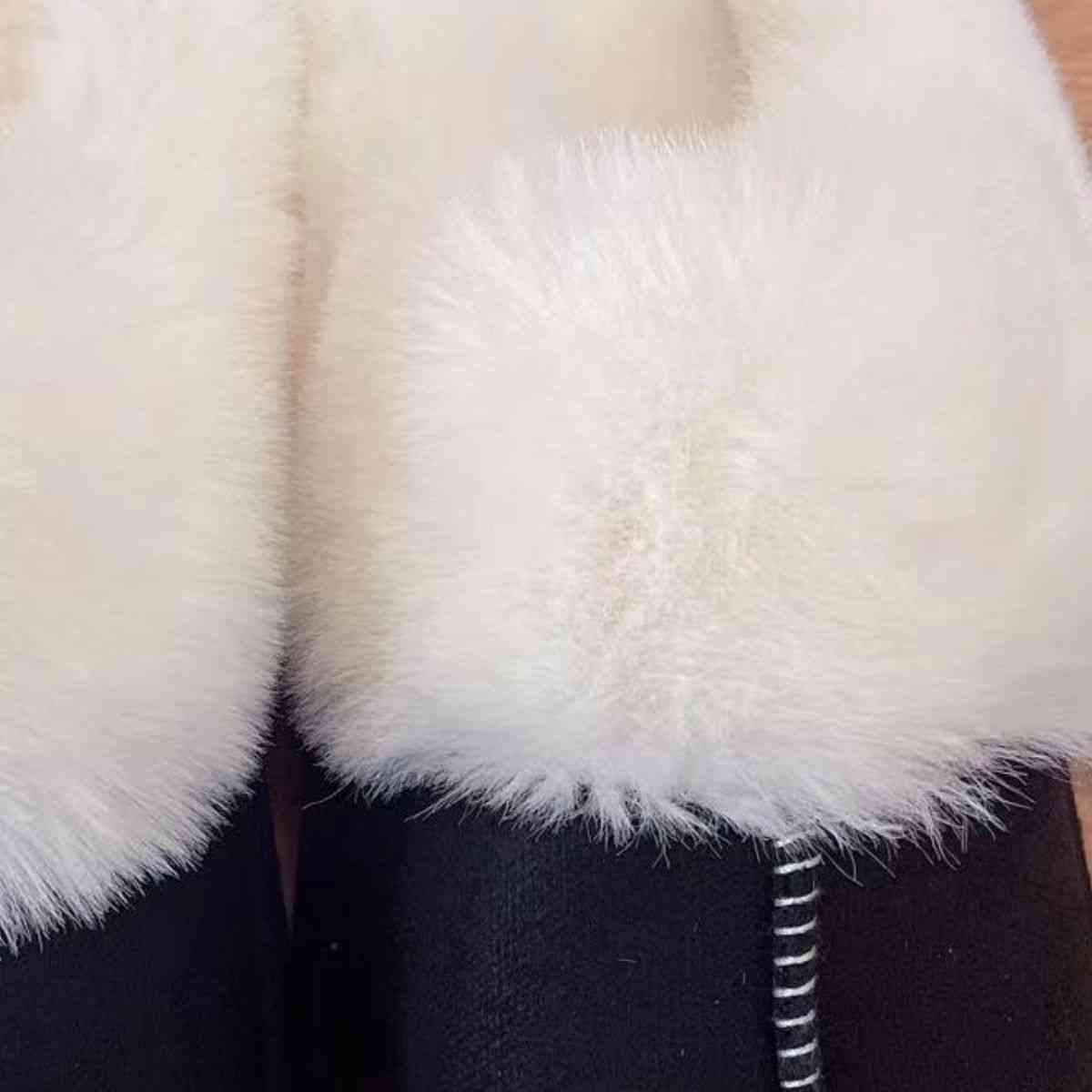 Comfortable black and white Trendsi vegan suede center seam slippers.